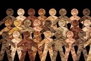 Global Diverse People and Diversity in society or international diverse workplace and tolerance celebration of multicultural culture inclusion and integration and pride as a multi cultural group from around the world on a black background.